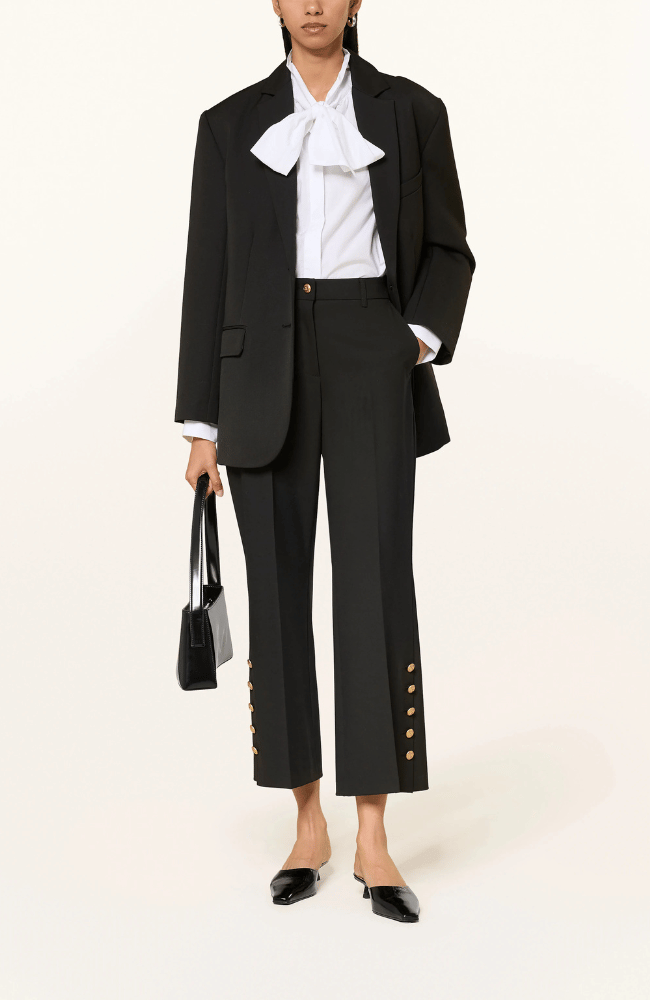 FRANCE STATEMENT SLIT PANT in BLACK-CAMBIO-FLOW BY NICOLE CANADA