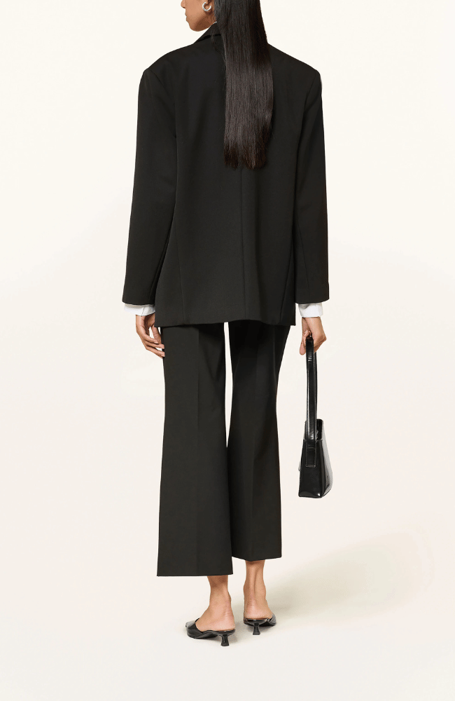 FRANCE STATEMENT SLIT PANT in BLACK-CAMBIO-FLOW BY NICOLE CANADA