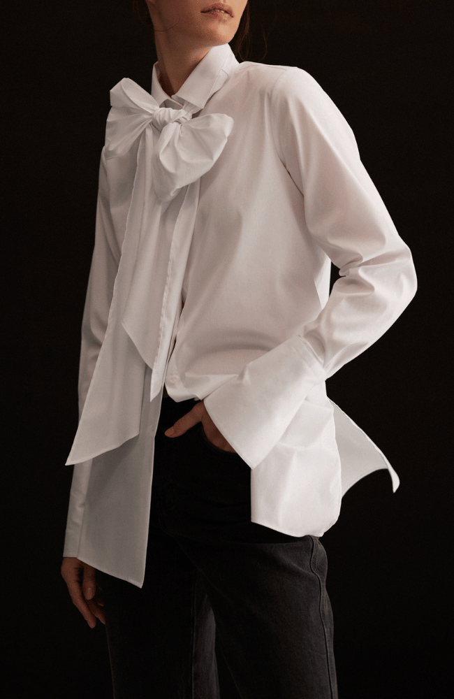 NEW VOYAGE BOW BLOUSE in WHITE-EMANOU-FLOW BY NICOLE CANADA