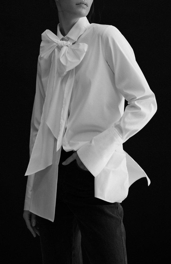 NEW VOYAGE BOW BLOUSE in WHITE-EMANOU-FLOW BY NICOLE CANADA
