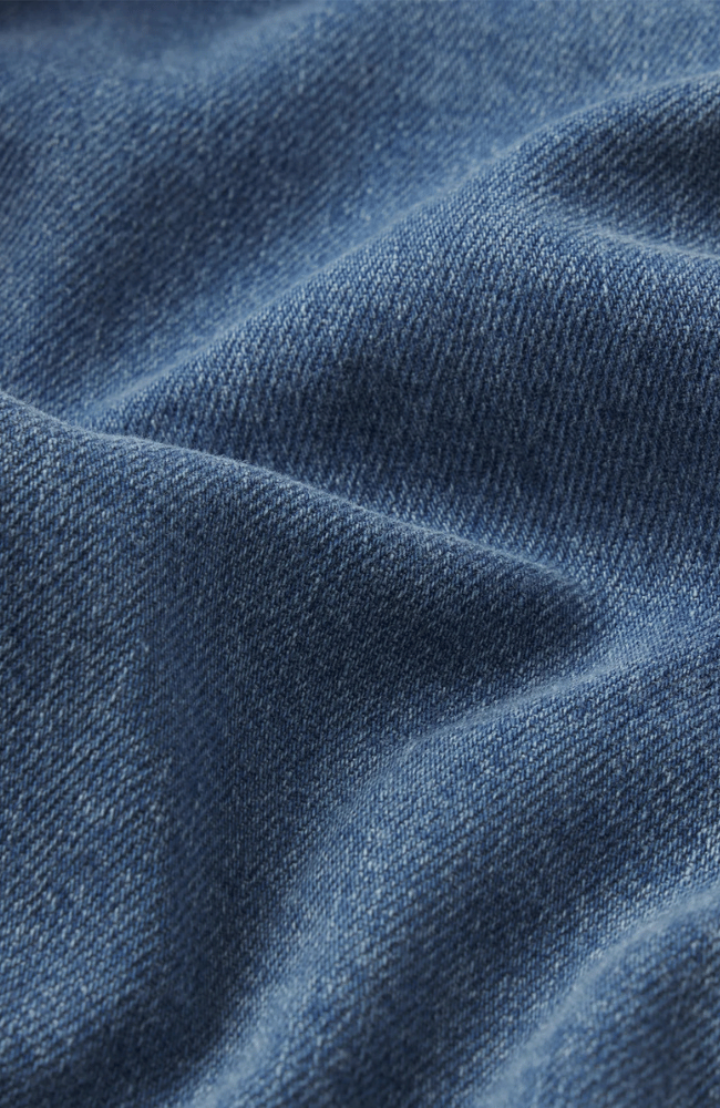 THE DENIM VNECK POPOVER TOP in SORA-FRAME-FLOW BY NICOLE CANADA