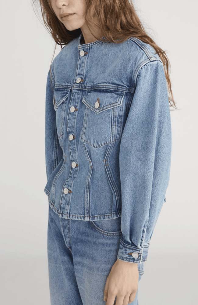 THE NIPPED COLLARLESS DENIM JACKET in UMBRIA-FRAME-FLOW BY NICOLE CANADA
