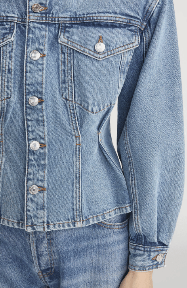 THE NIPPED COLLARLESS DENIM JACKET in UMBRIA-FRAME-FLOW BY NICOLE CANADA