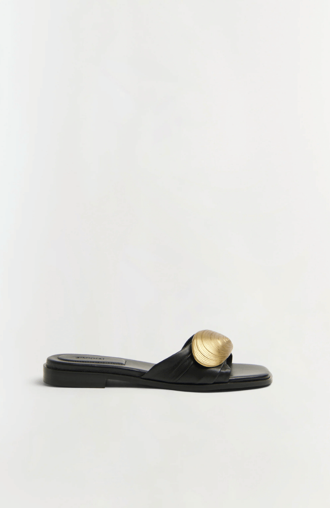 GIGI OYSTER LEATHER FLAT SLIDE in BLACK ANTIQUE GOLD-SIMKHAI-FLOW BY NICOLE CANADA